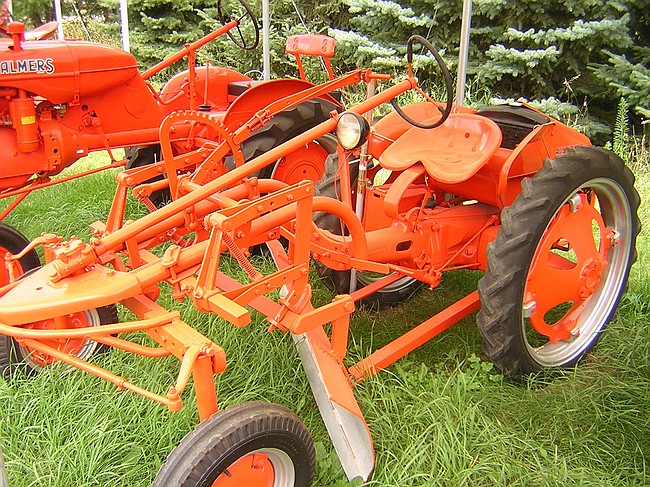 a model G, 11hp, with snowplow attachment