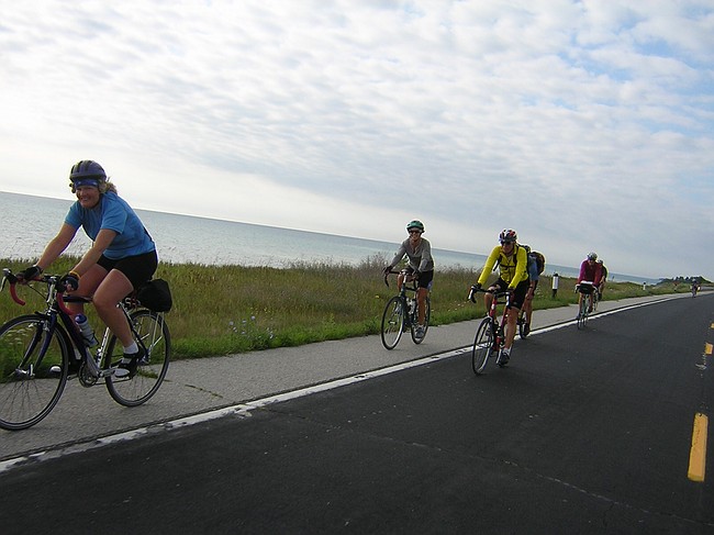 Jane leading a mellow group up the Lake Michigan shore